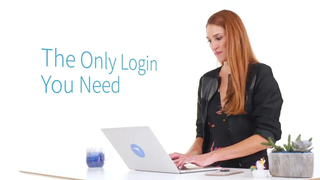 A Woman at the computer with text that reads: The Only Login You Need
